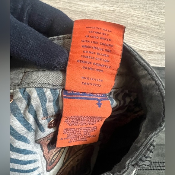 Rock Revival Armory Biker Faded Gray Distressed
Embellished Jeans - Picture 17 of 17